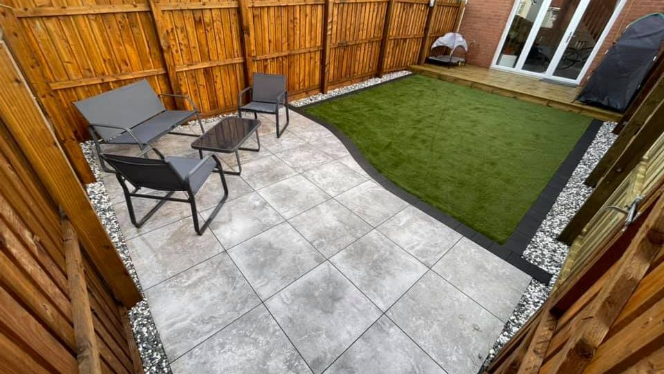 This weeks garden makeover! Decking extended, artificial grass installed, porcelain patio laid.