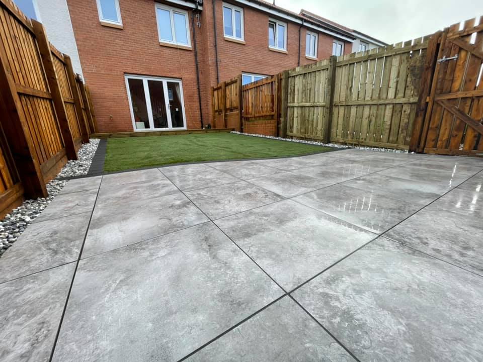 This weeks garden makeover! Decking extended, artificial grass installed, porcelain patio laid.