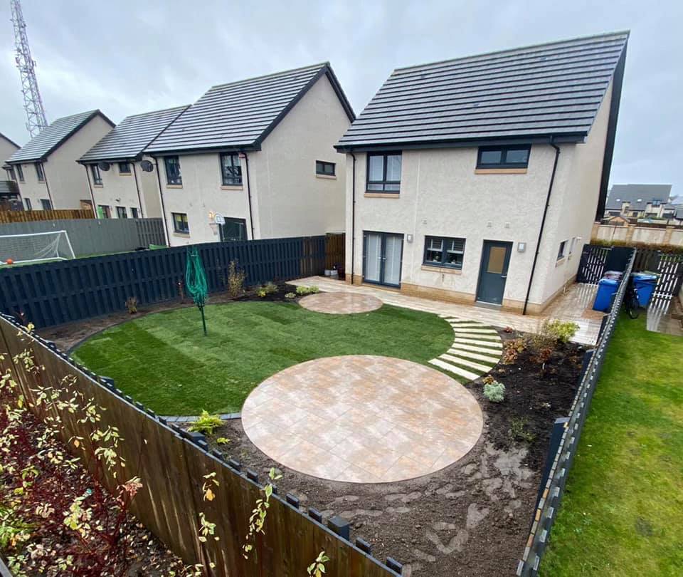 Job complete in Uddingston. This one was all about the soft lines and curves, with a mixture of two styles of porcelain, used and cut to create two circle patio areas with separate paths.