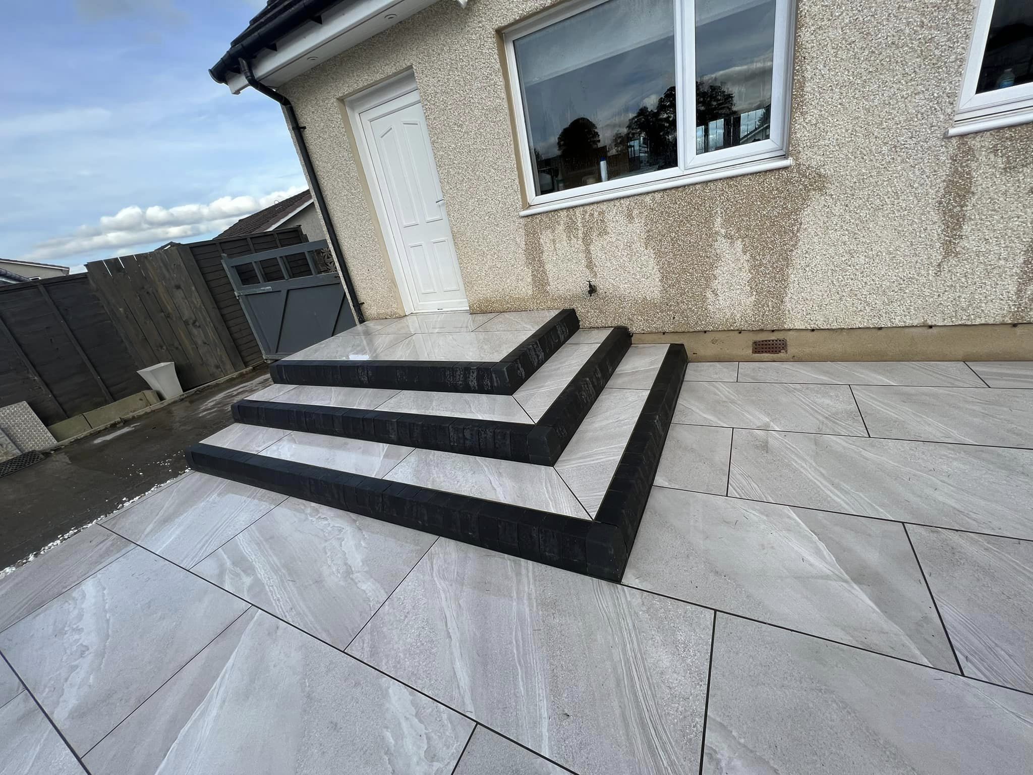 White quartzstone outdoor tiles - patio and steps