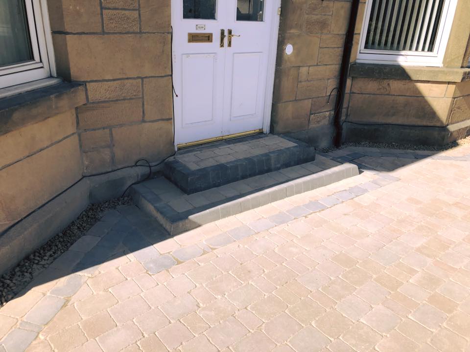 Before and after of country cobble driveway with new drains , steps and over 600 decorative kerbs installed.